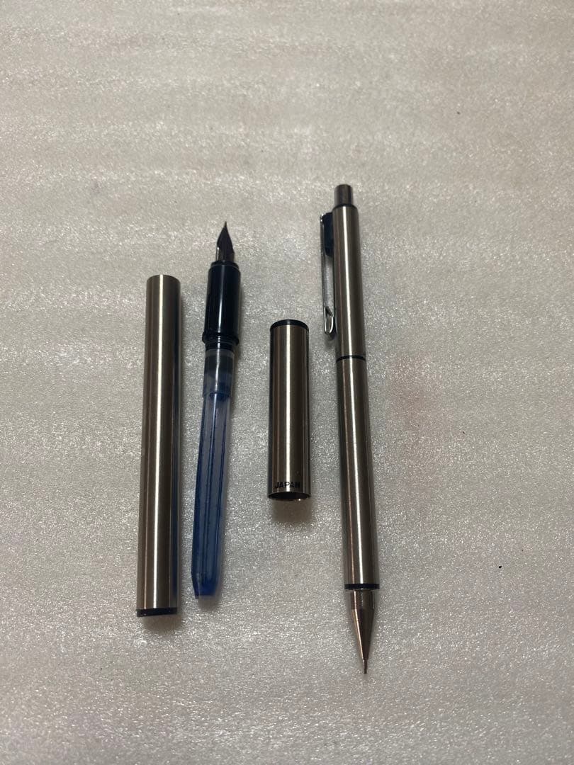 Pilot fountain pen and mechanical pencil set with sleek black barrels and silver accents