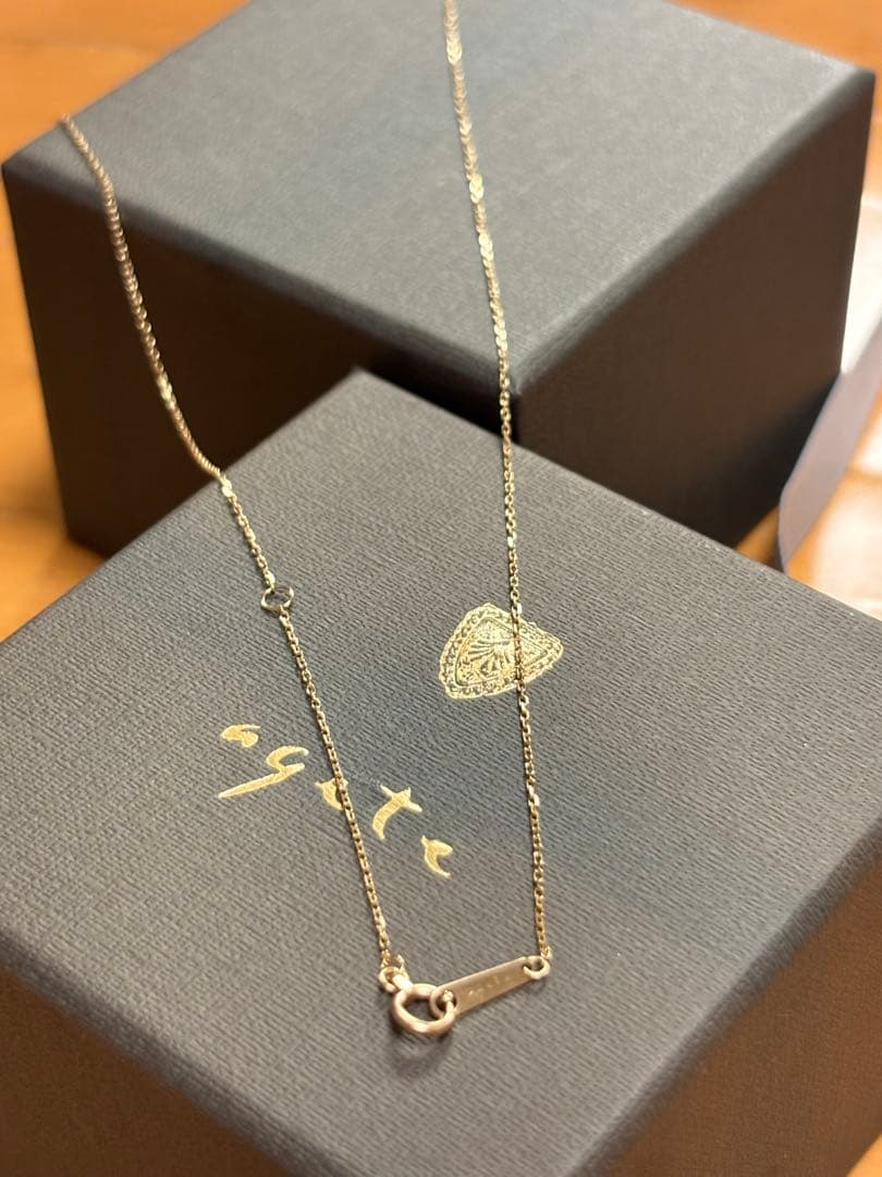 Agete K10 Multi-Stone Charm Necklace with yellow garnet and shell charms on a 45cm yellow gold chain