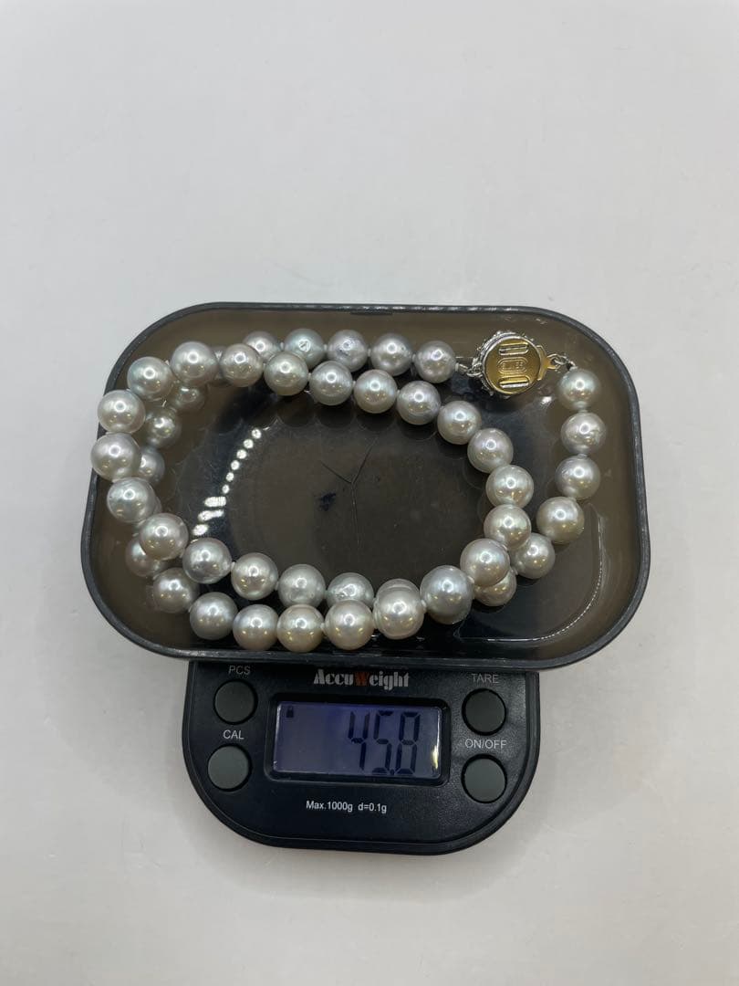 Akoya pearl silver necklace featuring 8.5mm natural blue-gray pearls on a 40 cm silver chain