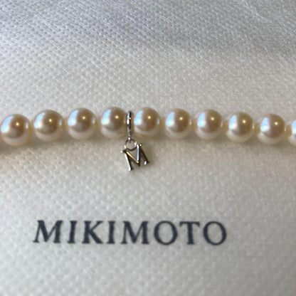 MIKIMOTO gradation pearl necklace with 5.8-9.1mm pearls, 48cm length, displayed on a white background