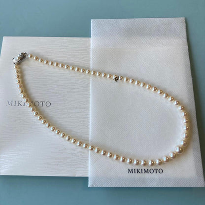MIKIMOTO gradation pearl necklace with 5.8-9.1mm pearls, 48cm length, displayed on a white background