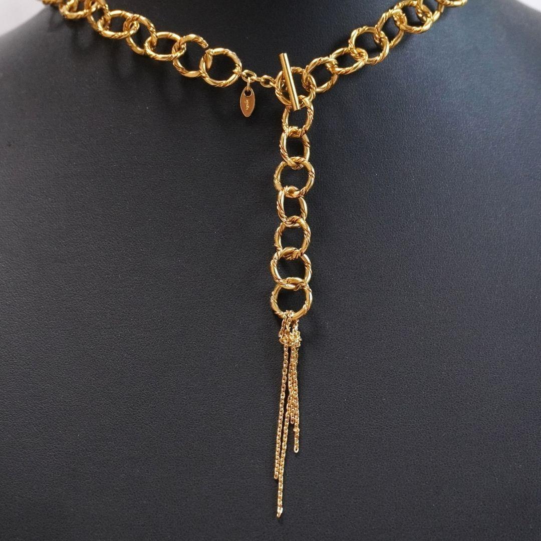 Agete 5-row gold necklace with long adjustable chain showing its length and clasp