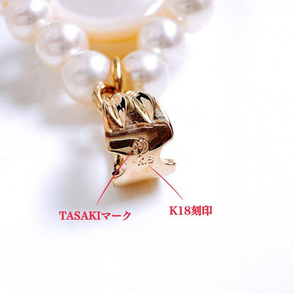 TASAKI K18 gold pearl necklace top featuring a 12mm Mabe pearl and 13 small 4.5mm Akoya pearls