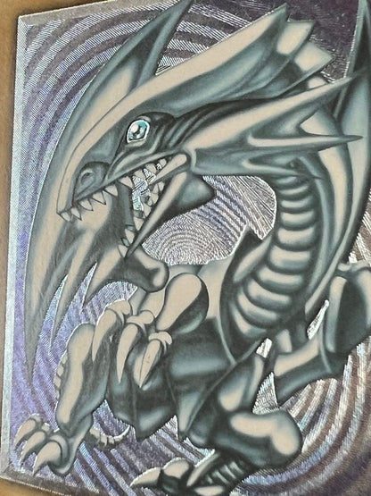 Spell of Mask Blue Eyes White Dragon Ultimate Rare Old Relic card with minor surface and corner damage