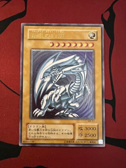 Spell of Mask Blue Eyes White Dragon Ultimate Rare Old Relic card with minor surface and corner damage
