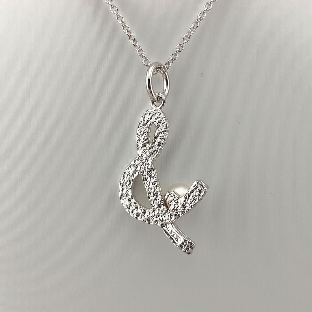 TASAKI Pearl Necklace in silver with 42cm adjustable chain and delicate pearl pendant