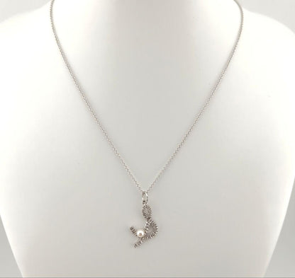 TASAKI Pearl Necklace in silver with 42cm adjustable chain and delicate pearl pendant