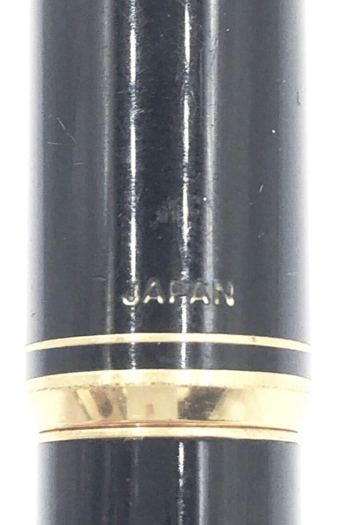 Pilot fountain pen with 14K gold fine nib, sleek black barrel, and silver clip made in Japan