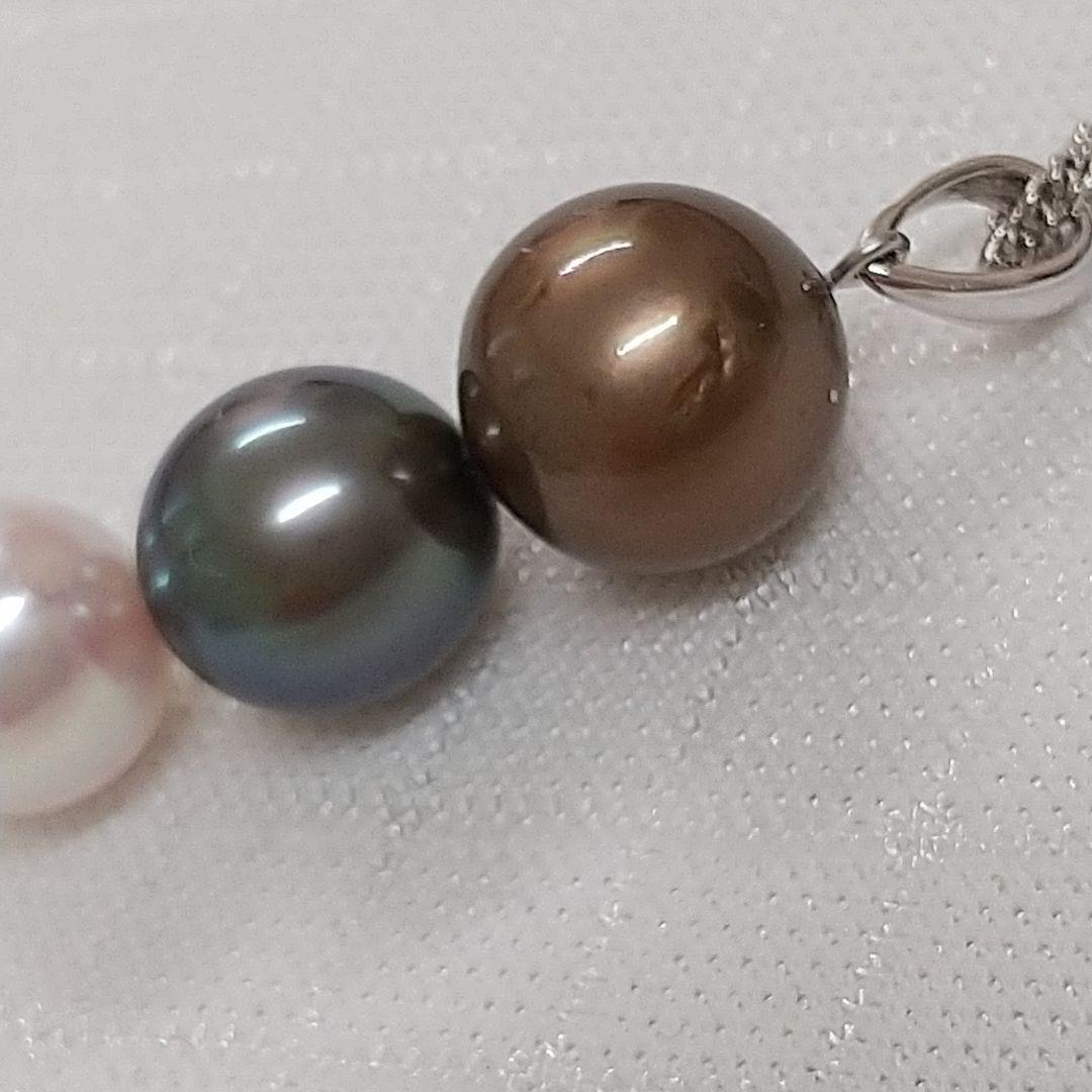 Law pendant with three round Tahiti black and Akoya pearls in varying colors on a service chain