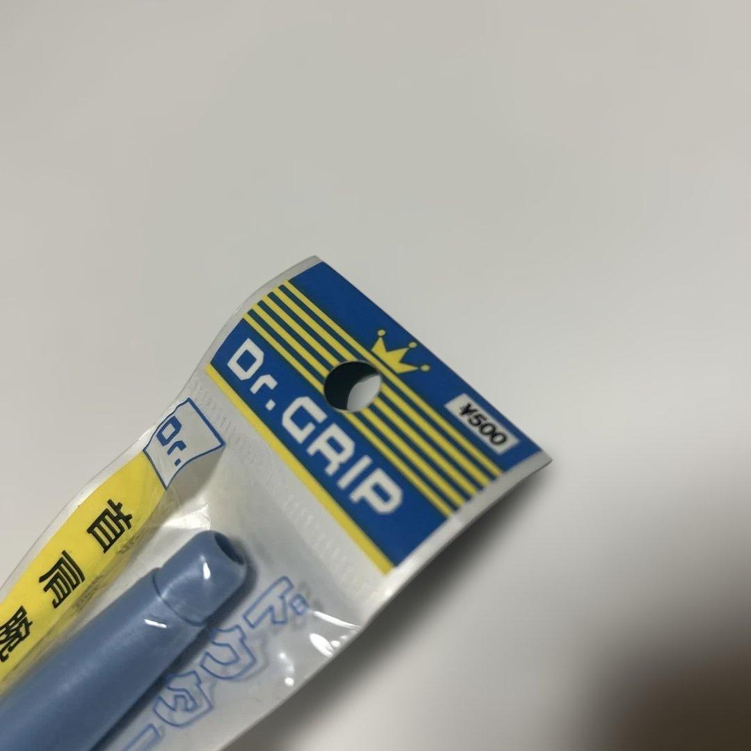 Initial Dr. Grip capped ballpoint pen in blue, brand new and unopened, shown with cap on