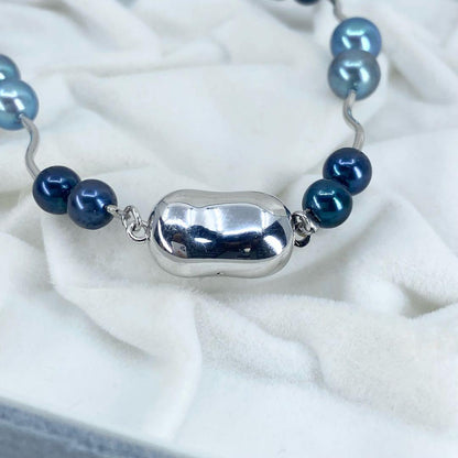Akoya pearl necklace with 5-7mm pearls and silver 925 clasp, approximately 42cm long