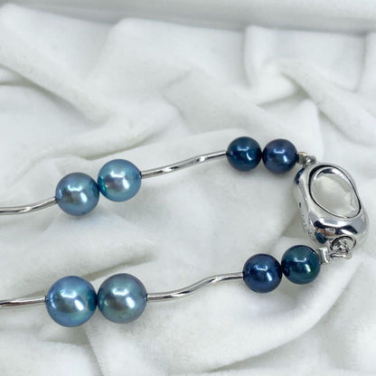 Akoya pearl necklace with 5-7mm pearls and silver 925 clasp, approximately 42cm long