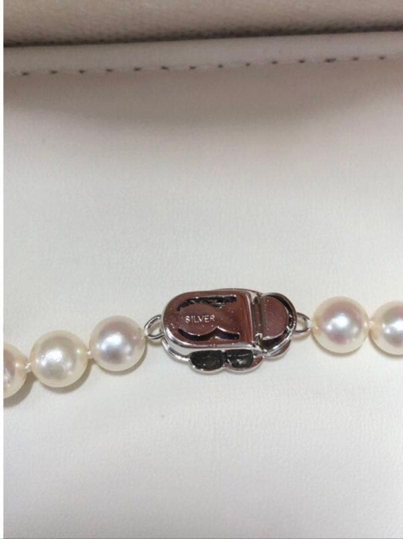 Akoya pearl necklace with 6.5-7.0mm pearls and matching 7.0mm earrings with silver clasp