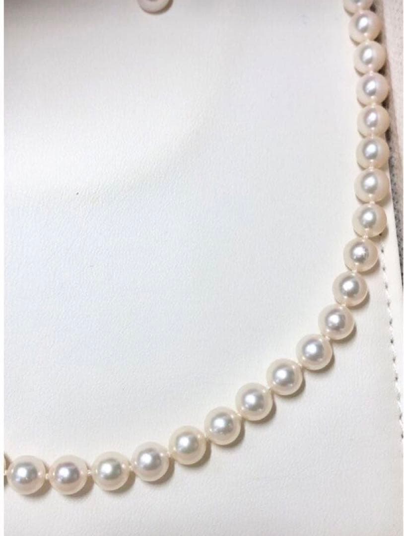 Akoya pearl necklace with 6.5-7.0mm pearls and matching 7.0mm earrings with silver clasp