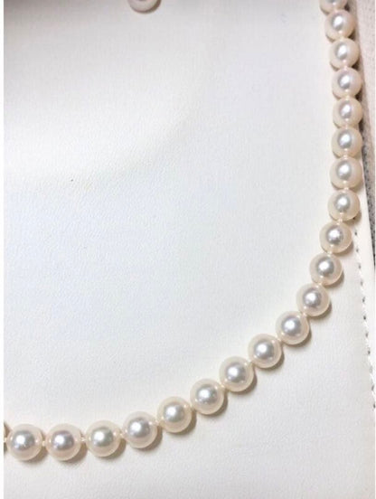Akoya pearl necklace with 6.5-7.0mm pearls and matching 7.0mm earrings with silver clasp