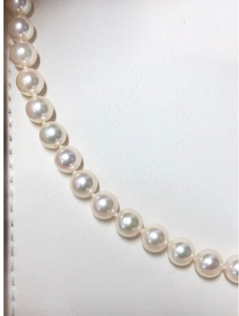 Akoya pearl necklace with 6.5-7.0mm pearls and matching 7.0mm earrings with silver clasp