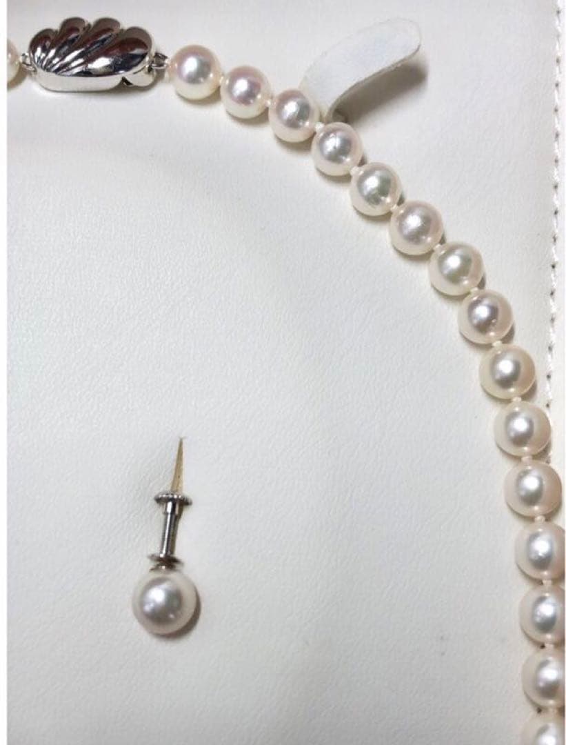 Akoya pearl necklace with 6.5-7.0mm pearls and matching 7.0mm earrings with silver clasp