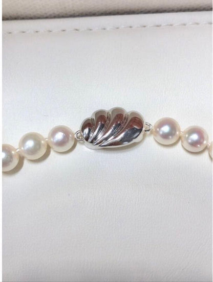 Akoya pearl necklace with 6.5-7.0mm pearls and matching 7.0mm earrings with silver clasp