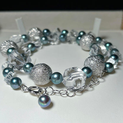 Akoya pearl necklace with mirror ball and crystal accents featuring 7.2-7.6mm round pearls on a 48cm silver chain