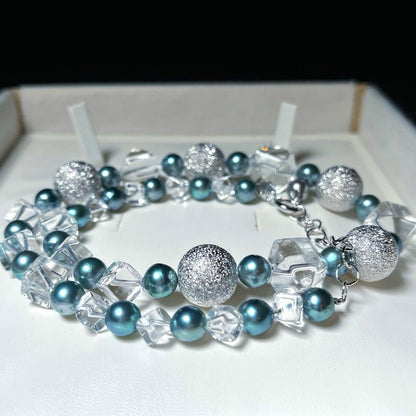 Akoya pearl necklace with mirror ball and crystal accents featuring 7.2-7.6mm round pearls on a 48cm silver chain