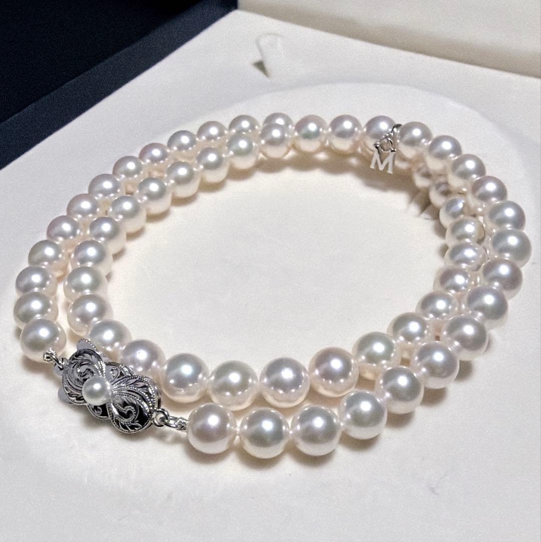 Mikimoto Akoya Pearl Necklace with 7.0 mm pearls and charm, 42cm length, displayed on white background