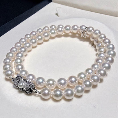 Mikimoto Akoya Pearl Necklace with 7.0 mm pearls and charm, 42cm length, displayed on white background