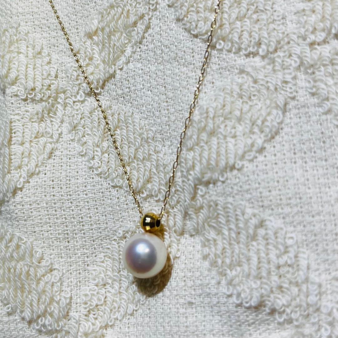 K18 yellow gold necklace with 8mm Akoya pearls approximately 40cm long adjustable length