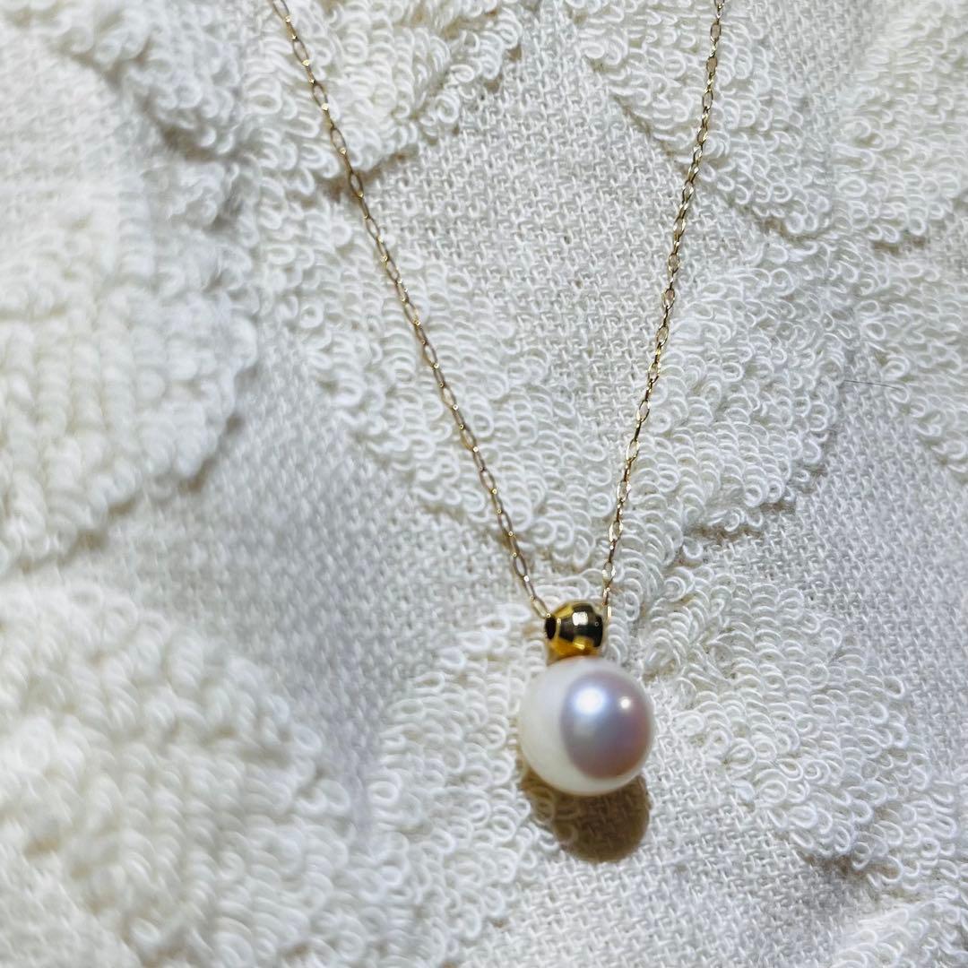 K18 yellow gold necklace with 8mm Akoya pearls approximately 40cm long adjustable length