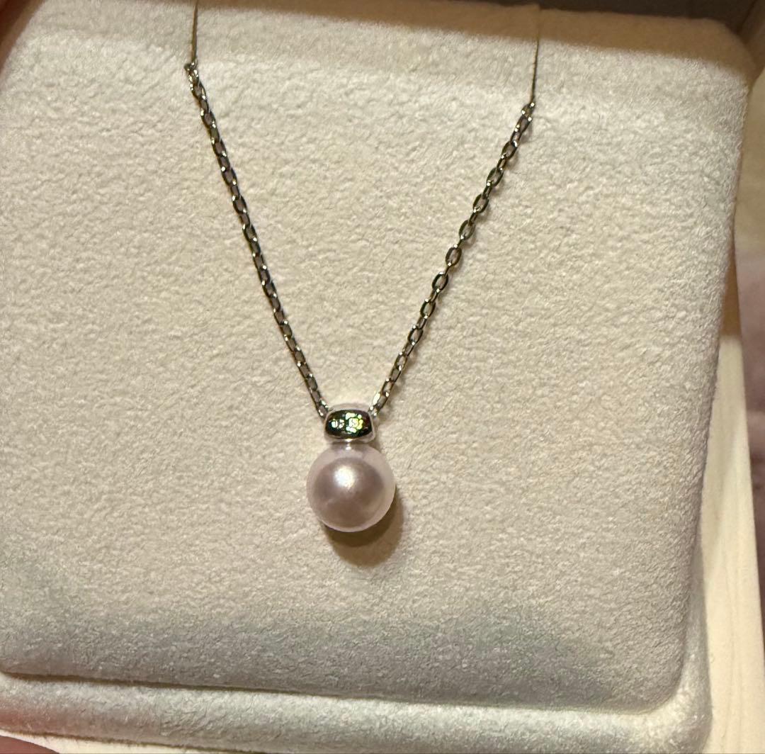 Mikimoto Pearl Pendant Necklace with simple design and adjustable chain displayed with gift box and ribbon