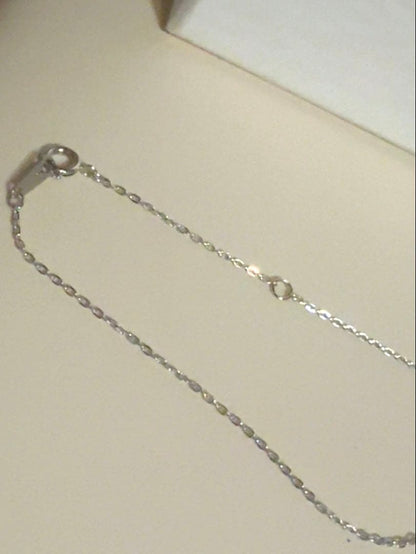 Mikimoto Pearl Pendant Necklace with simple design and adjustable chain displayed with gift box and ribbon