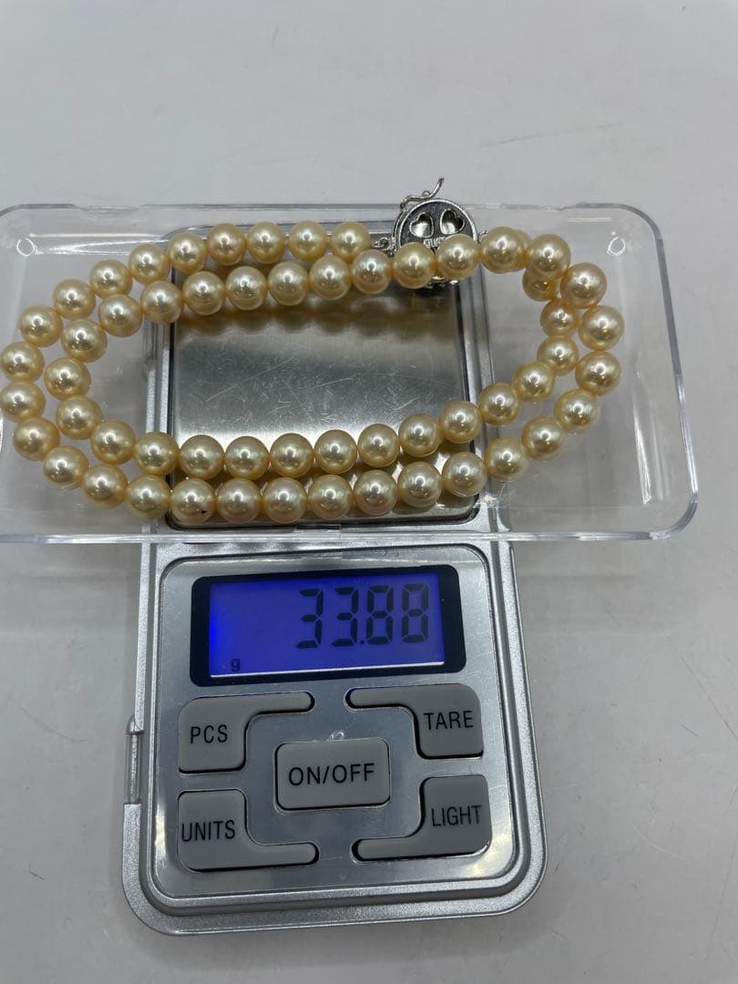 Akoya pearl necklace with 7mm genuine pearls on a 40 cm silver chain weighing 33.8 grams
