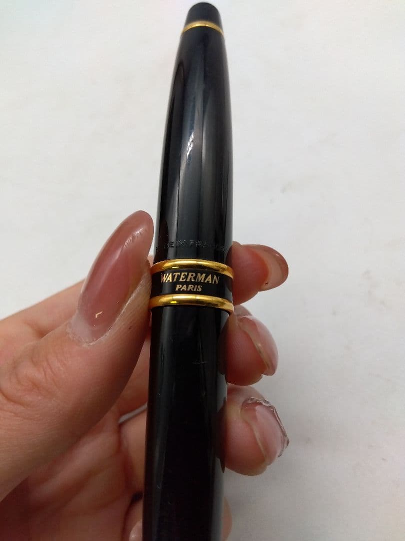 Waterman fountain pen with black body and gold accents, manufactured in France
