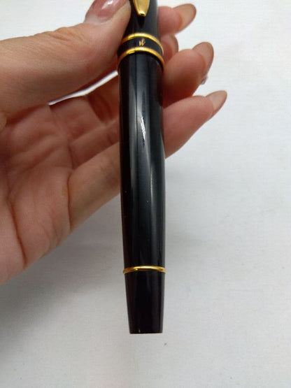 Waterman fountain pen with black body and gold accents, manufactured in France