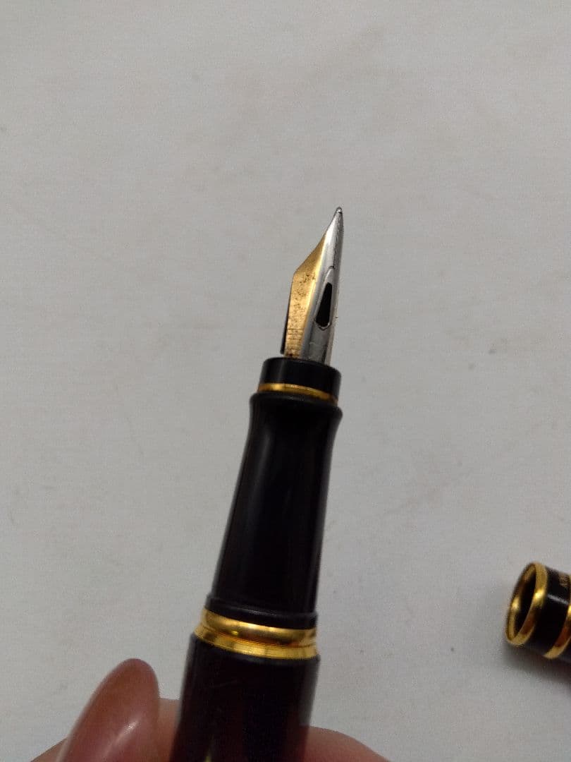 Waterman fountain pen with black body and gold accents, manufactured in France