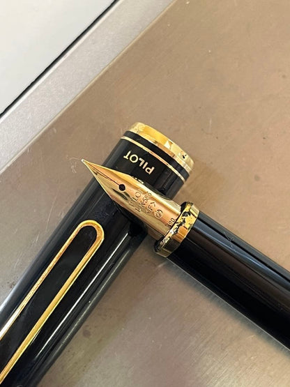 M149 PILOT black fountain pen with 14K fine nib and sleek black body