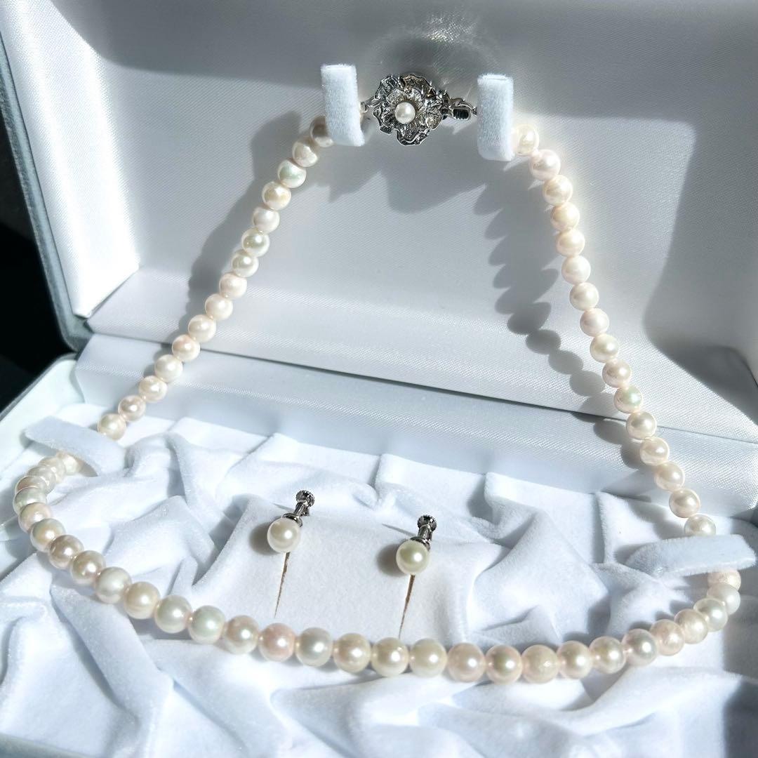 Earring set featuring 6.5-6mm Akoya pearls with matching 43 cm pearl necklace