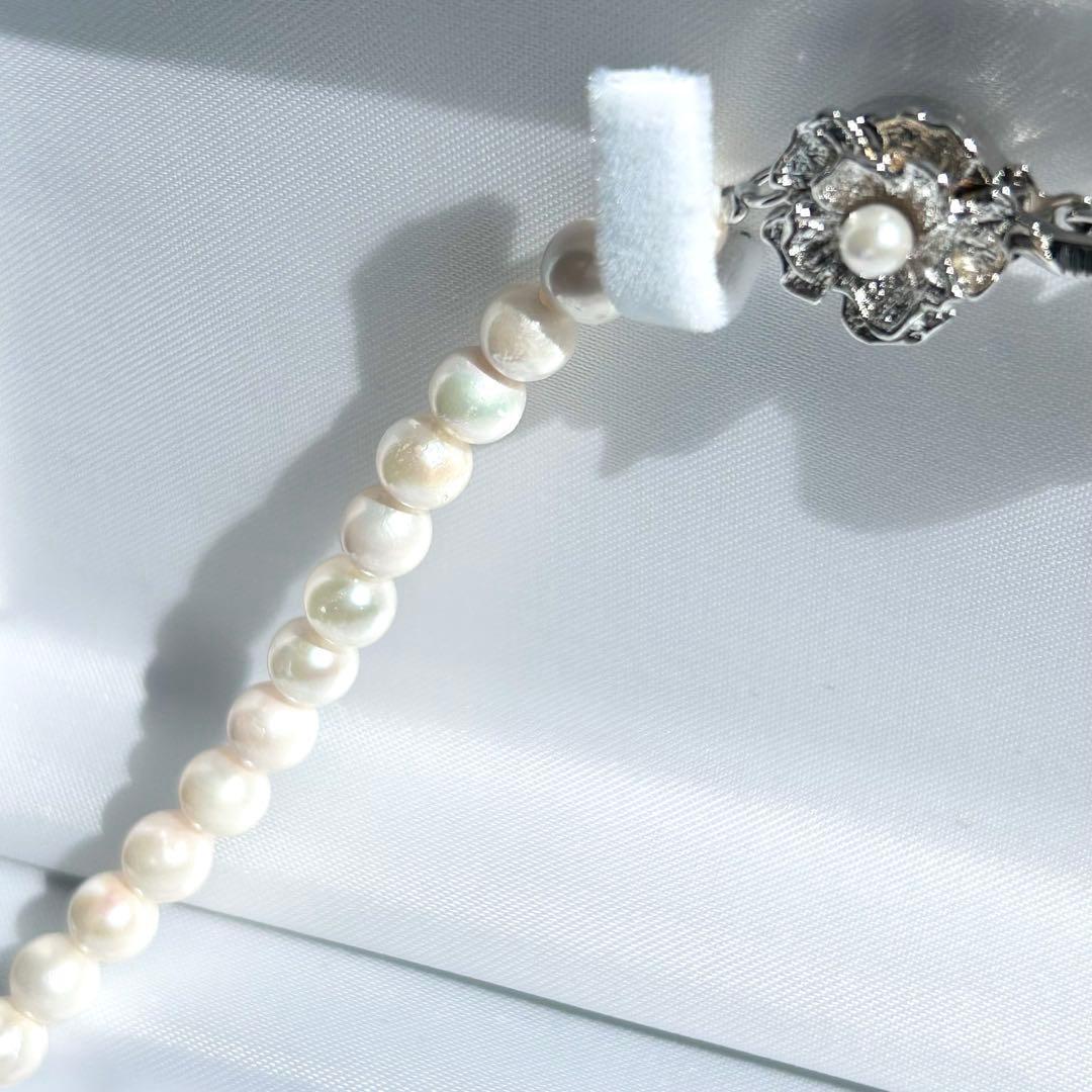 Earring set featuring 6.5-6mm Akoya pearls with matching 43 cm pearl necklace
