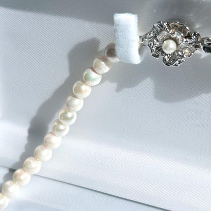 Earring set featuring 6.5-6mm Akoya pearls with matching 43 cm pearl necklace