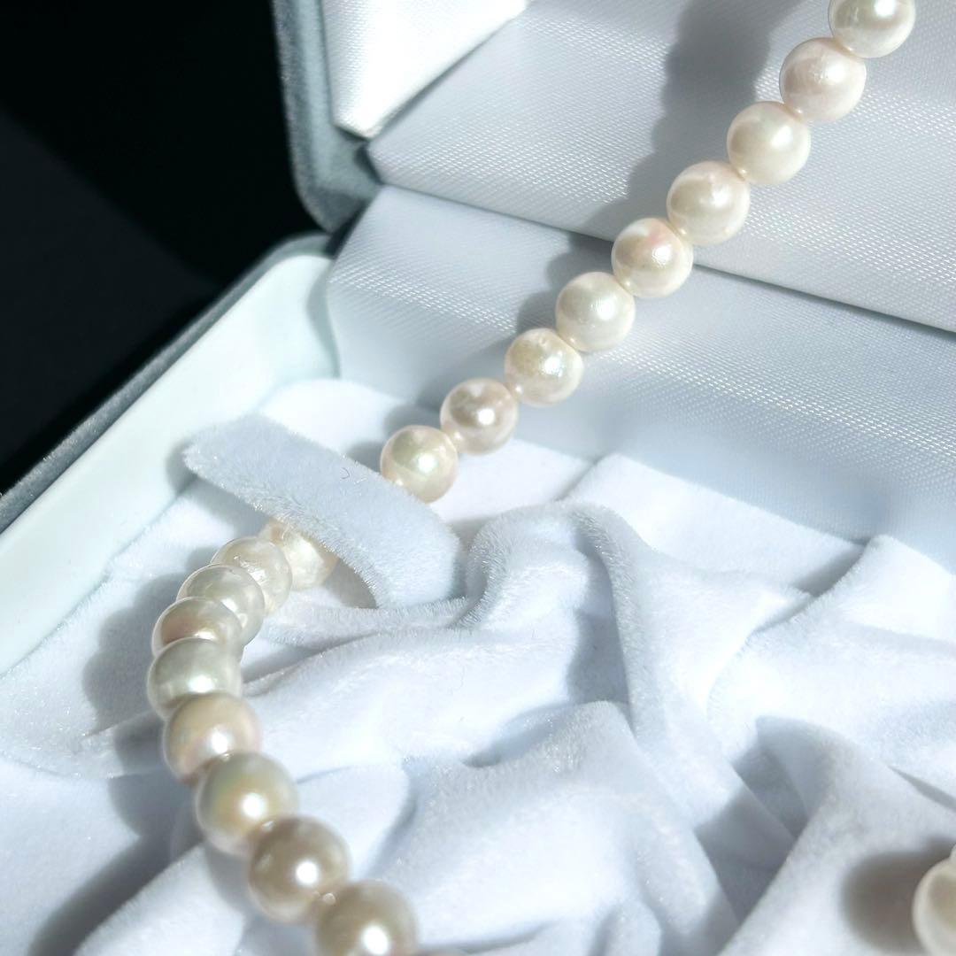 Earring set featuring 6.5-6mm Akoya pearls with matching 43 cm pearl necklace