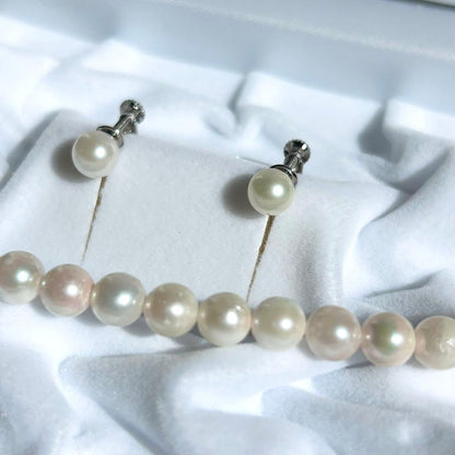 Earring set featuring 6.5-6mm Akoya pearls with matching 43 cm pearl necklace