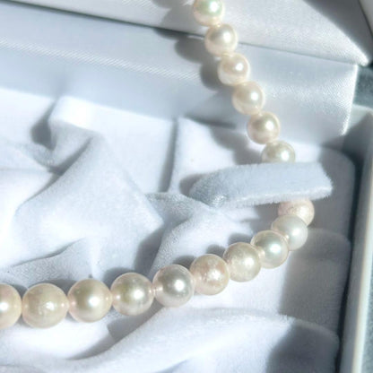 Earring set featuring 6.5-6mm Akoya pearls with matching 43 cm pearl necklace