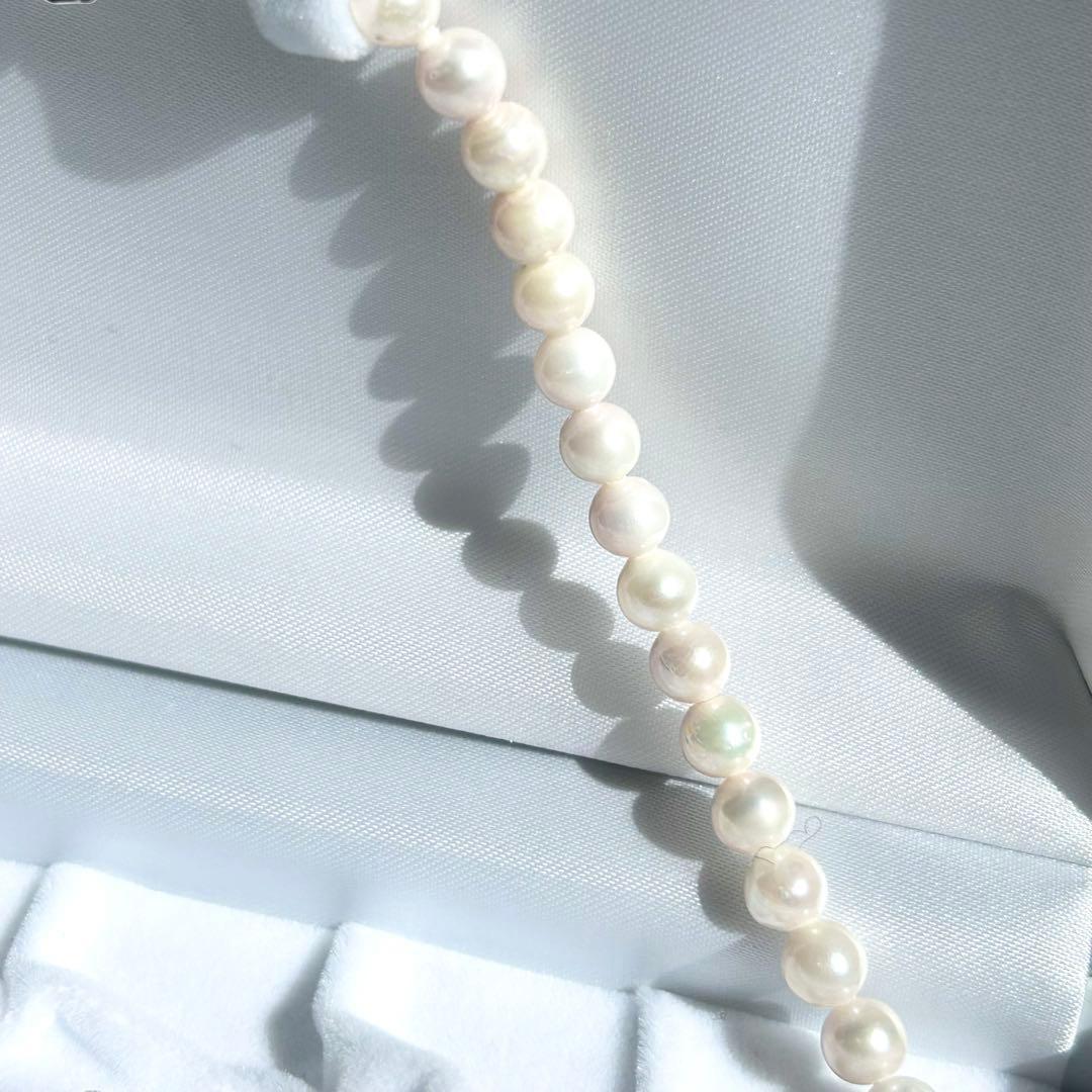 Earring set featuring 6.5-6mm Akoya pearls with matching 43 cm pearl necklace