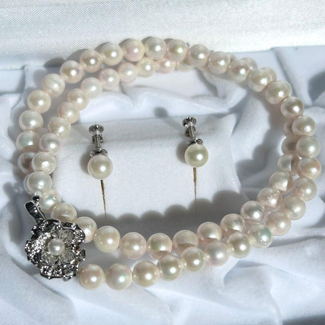 Earring set featuring 6.5-6mm Akoya pearls with matching 43 cm pearl necklace