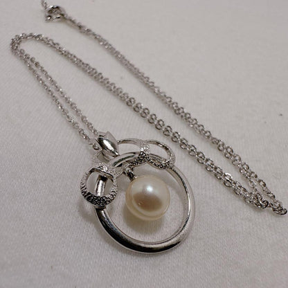 MIKIMOTO Silver Akoya Pearl Round Necklace featuring a single pearl pendant on a 40.5 cm silver chain