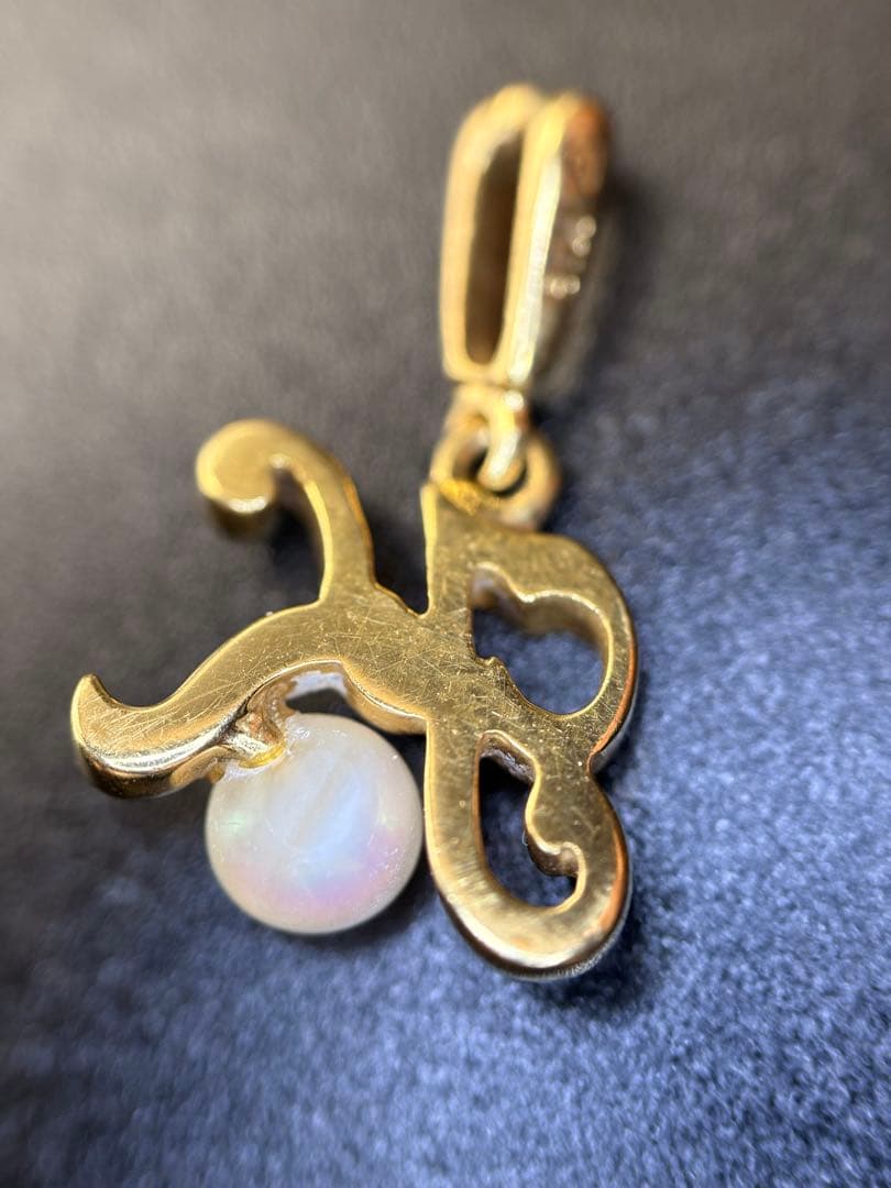 Mikimoto K18 gold necklace with baby Akoya pearl pendant in the shape of an initial letter