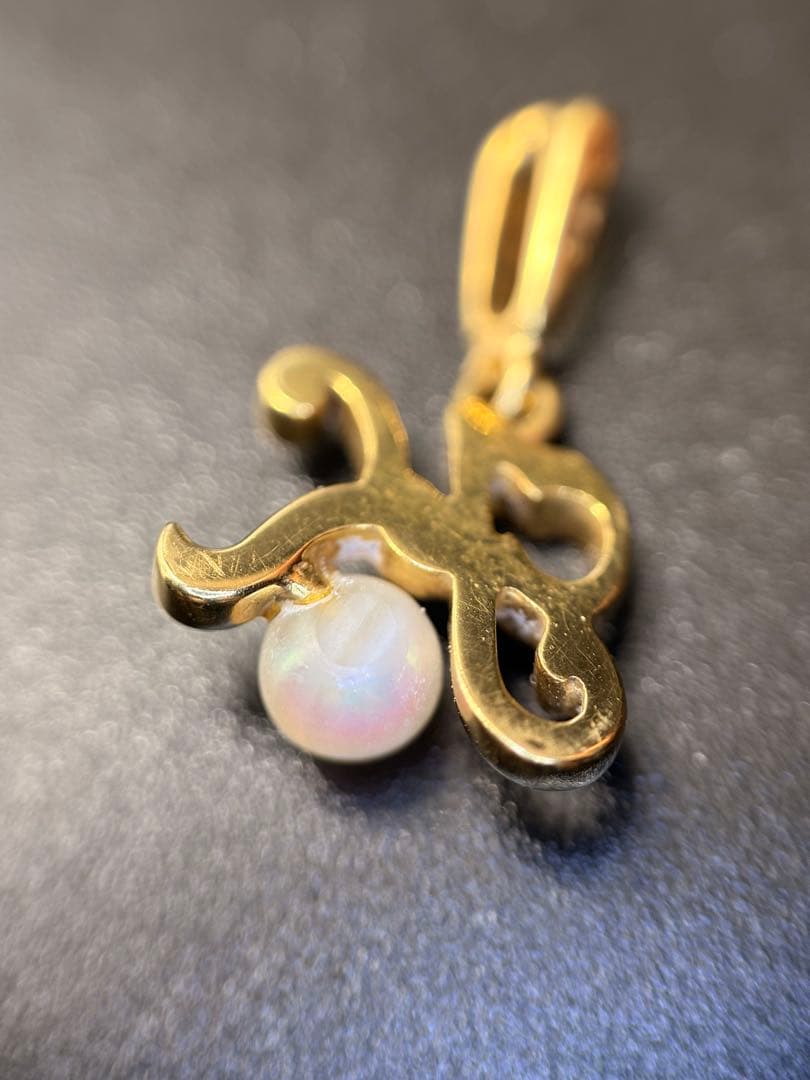 Mikimoto K18 gold necklace with baby Akoya pearl pendant in the shape of an initial letter