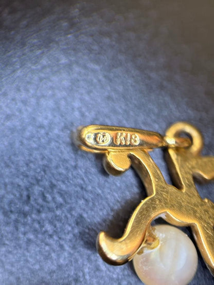 Mikimoto K18 gold necklace with baby Akoya pearl pendant in the shape of an initial letter