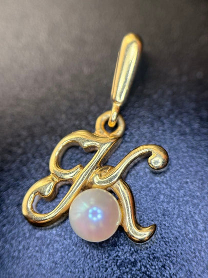 Mikimoto K18 gold necklace with baby Akoya pearl pendant in the shape of an initial letter