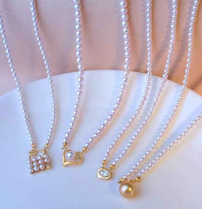 Law K18YG yellow gold heart pendant necklace with 5-5.5 mm Akoya pearl charm