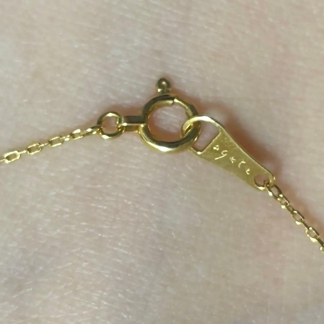 Agete K18 yellow gold necklace with millegrain diamond accents and single Akoya pearl on adjustable 40 cm chain